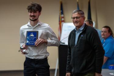 Division 2 senior winner Konner Knoll of North Idaho STEM Charter Academy poses for a photo with NIC President Nick Swayne during NIC’s 42nd annual Math Contest on Tuesday, Nov. 4 at North Idaho College’s Coeur d’Alene campus.