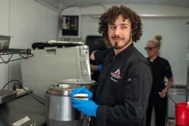 North Idaho College student Finnegan Vitale works in the NIC Food Truck on April 24, 2024, on NIC’s Coeur d’Alene campus.